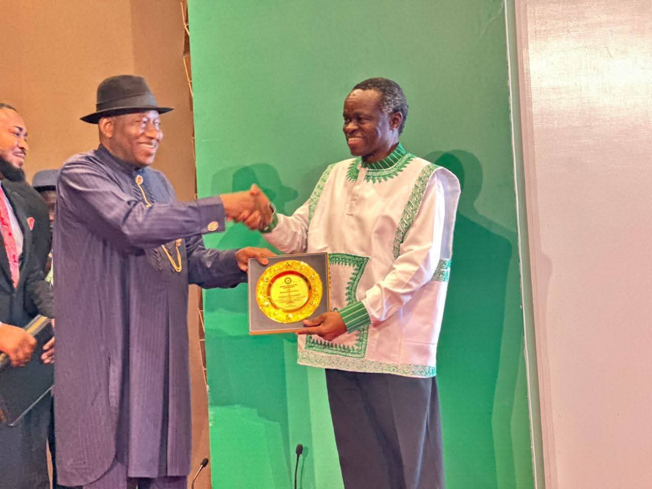 Capt. Promise S. Ominisan receiving recognition from H.E. Dr. Goodluck Jonathan